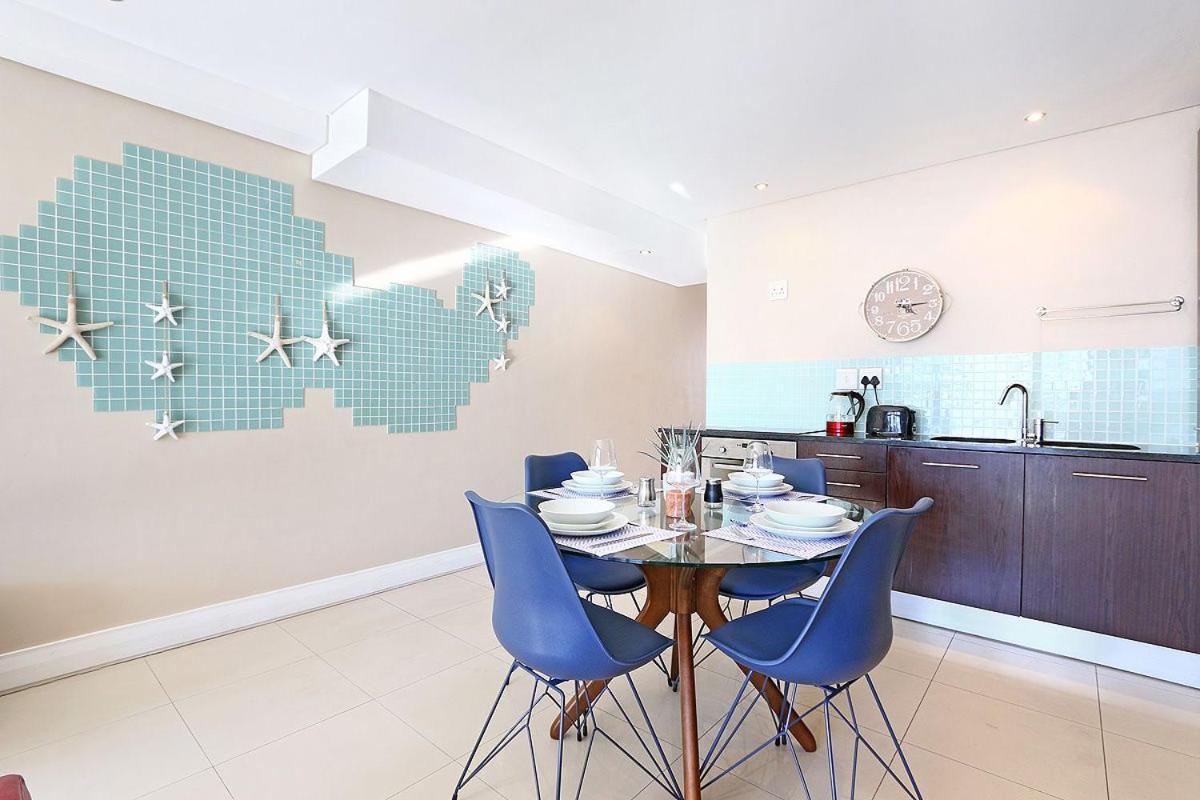 Appartamento Eden On The Bay 118 By Hostagents Bloubergstrand Esterno foto