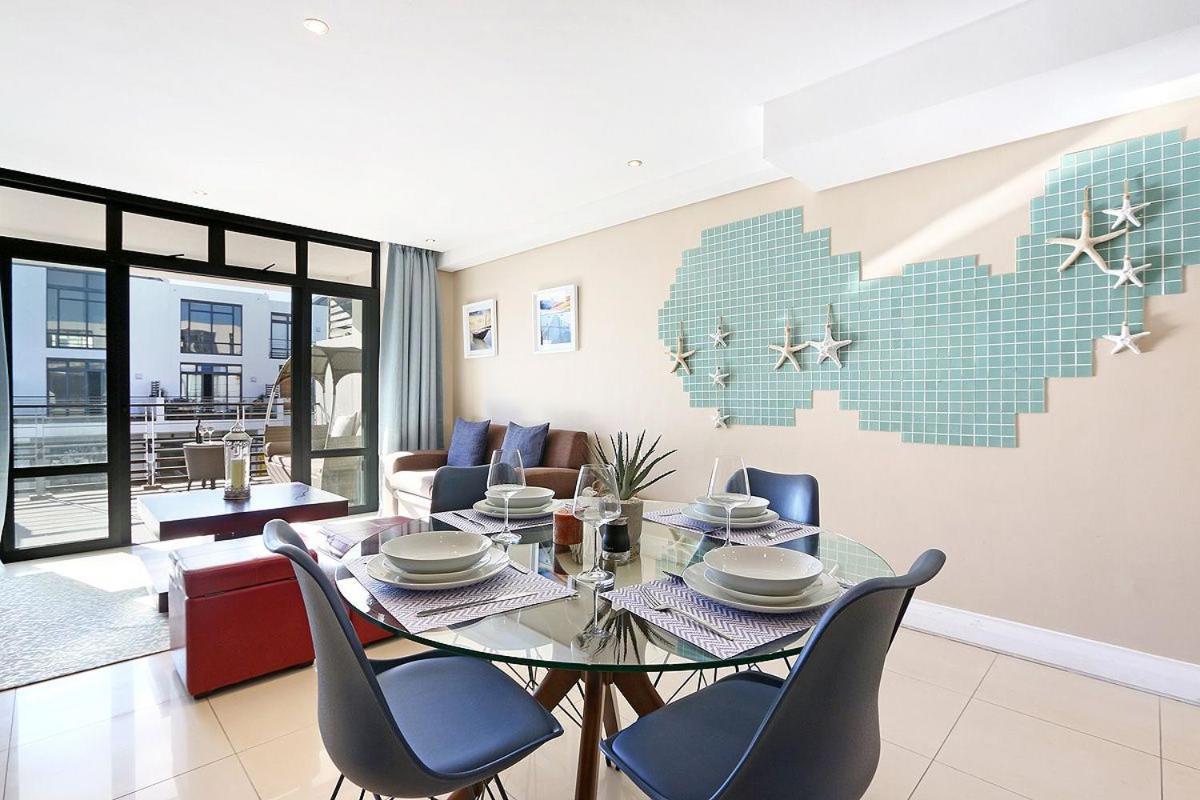 Appartamento Eden On The Bay 118 By Hostagents Bloubergstrand Esterno foto